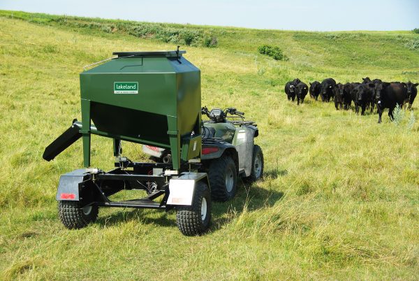 15 Bushel UTV Easy Feeder on Trailer in Field with cattle- Lakeland